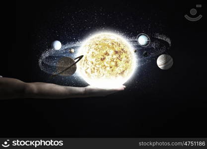 Close up of planet sun system in your hand. Sun system