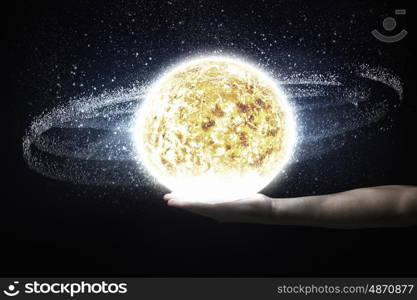 Close up of planet sun system in your hand. Sun system