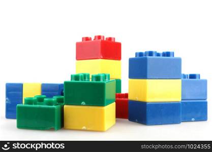 Close-Up Of Plastic Building Blocks Against White Background