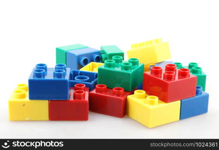 Close-Up Of Plastic Building Blocks Against White Background