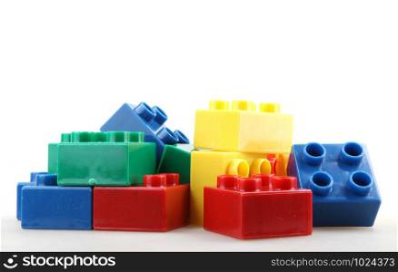 Close-Up Of Plastic Building Blocks Against White Background