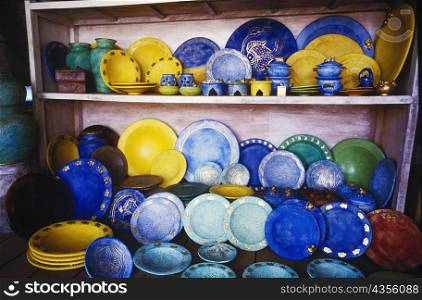 Close-up of plates on a shelf, Bali, Indonesia