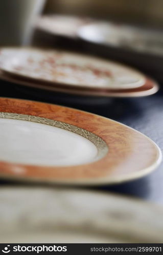 Close-up of plates on a table