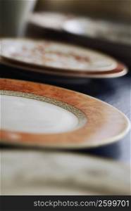 Close-up of plates on a table