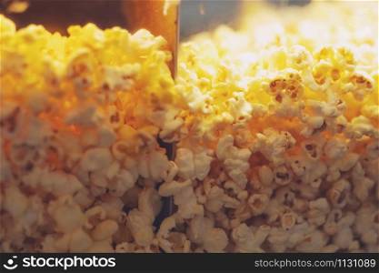 Close up of popcorn machine at the cinema texture background