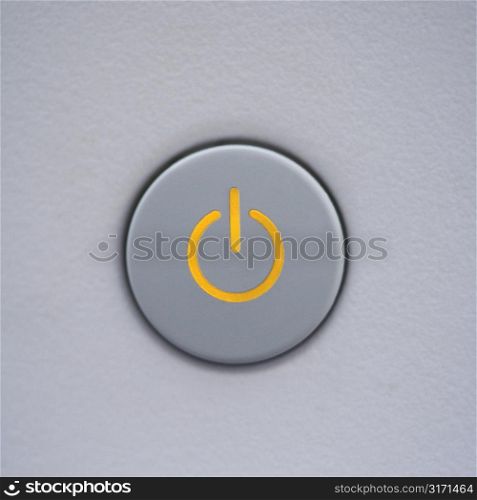 Close up of power symbol on power button on computer.