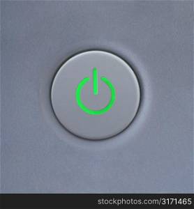 Close up of power symbol on power button on computer.