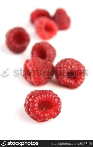 Close-up of raspberries on wite background