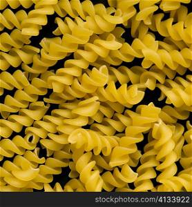 Close-up of raw fusilli pasta