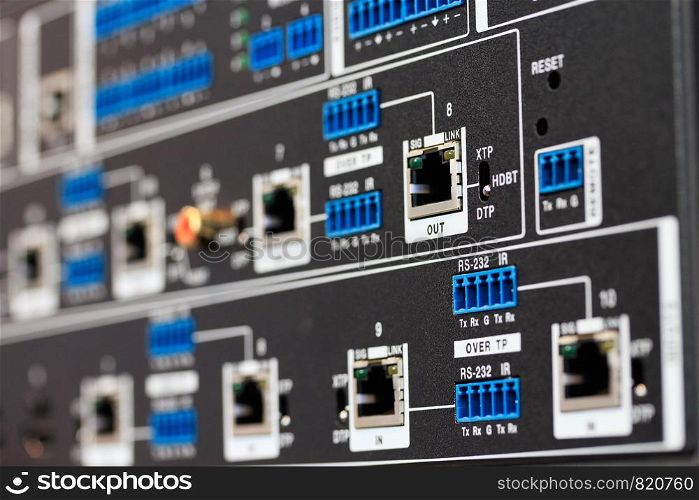 Close up of rear panel of HDBaseT equipment. Selective focus.