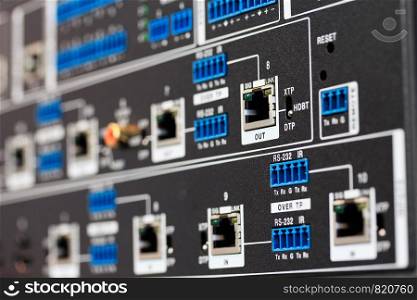 Close up of rear panel of HDBaseT equipment. Selective focus.