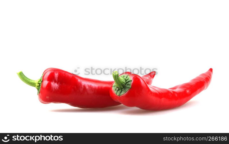 Close-Up Of Red Chili Pepper Against White Background