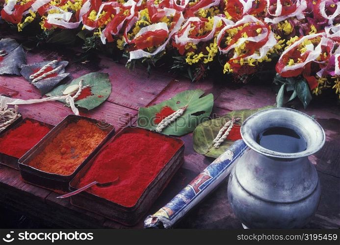 Close-up of religious offerings