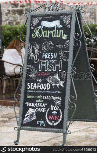 Close-up of restaurant signboard, Perast, Bay of Kotor, Montenegro