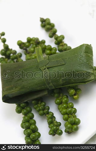 Close-up of rice dumpling on Chinese green pepper