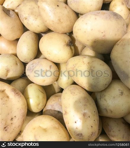 Close-Up Of Ripe Potatoes. Healthy Fresh Food Background.