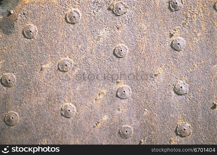 Close-up of rivets on a metal surface