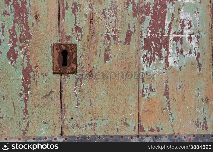 Close up of rustic old door in Sicily, Acireale, Catania