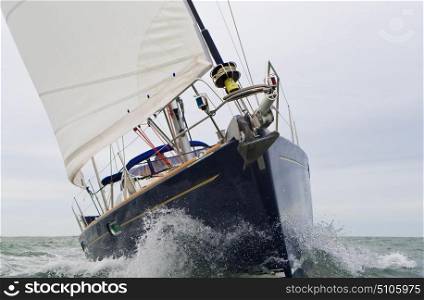 Close up of sailing boat, sail boat or yacht at sea