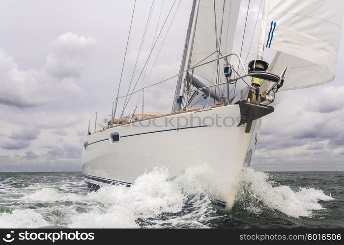 Close up of sailing boat, sail boat or yacht at sea