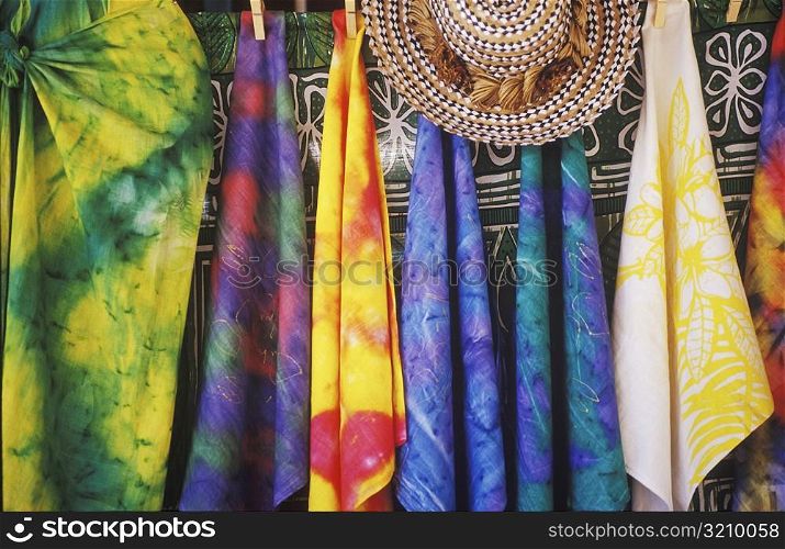 Close-up of sarongs hanging at a market stall, Hawaii, USA