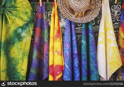 Close-up of sarongs hanging at a market stall, Hawaii, USA