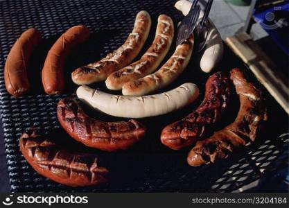 Close-up of sausages on a barbecue grill, Gruyeres, Switzerland