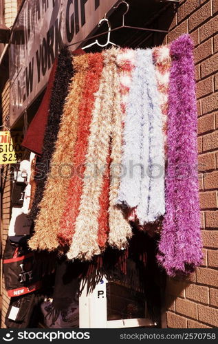 Close-up of scarves hanging on a hanger