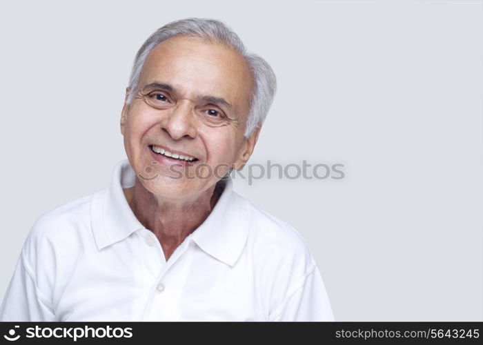 Close-up of senior man over white background