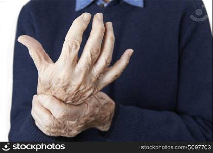 Close Up Of Senior Man Suffering With Arthritis