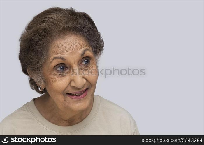 Close-up of senior woman looking at copy space