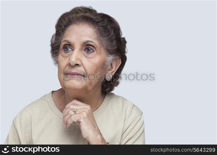 Close-up of senior woman thinking