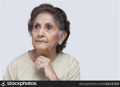 Close-up of senior woman thinking