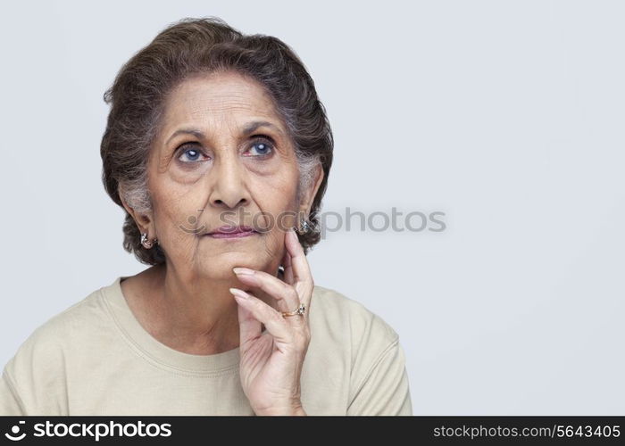 Close-up of senior woman thinking