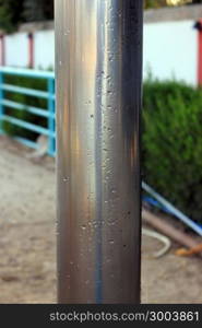 Close up of shiny metal pipe