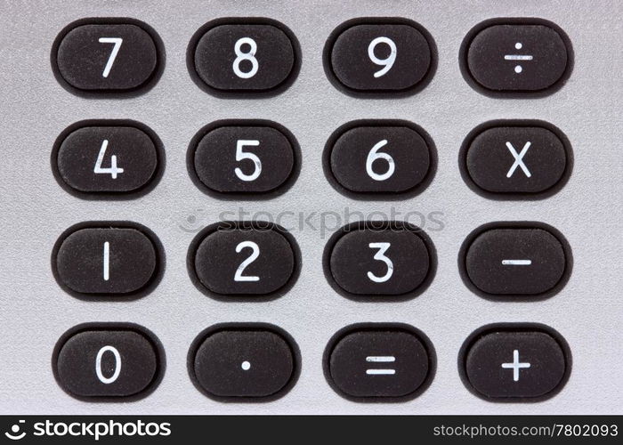 close-up of silver calculator with black buttons