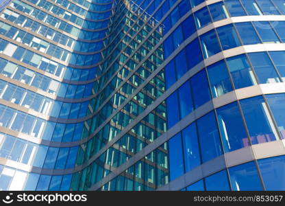 close up of skyscraper window. Blue colored