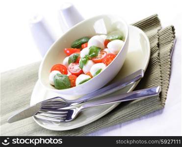 Close - up of sliced tomatoes with mozarella