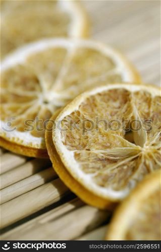 Close-up of slices of lime on sticks