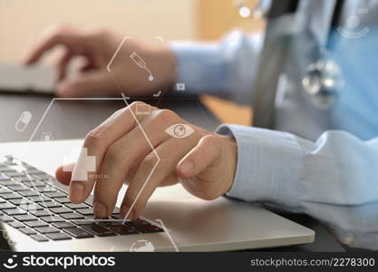 close up of smart medical doctor working with laptop computer and mobile phone and stethoscope on dark wooden desk with virtual reality icon diagram