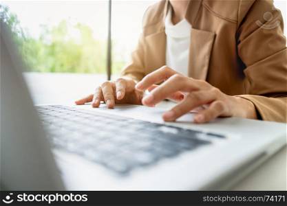 close up of Smart woman working at home office thinking new business project
