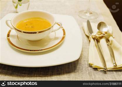 Close-up of soup in a bowl on a dining table
