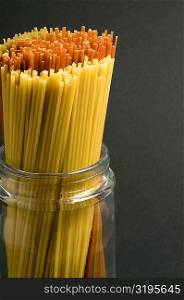Close-up of spaghettis in a jar