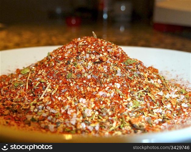 close up of spice mix on a white plate
