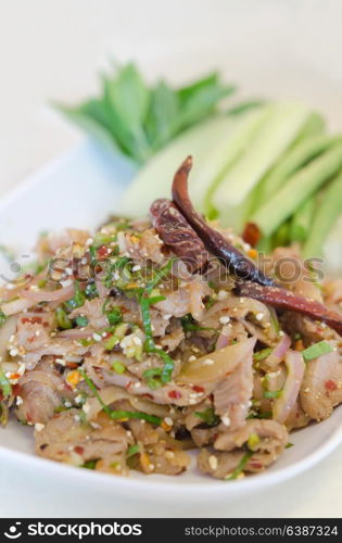 close up of spicy minced pork served with fresh vegetable. spicy minced pork