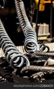 Close up of spiral hose pipes on the rear of a semi truck tractor