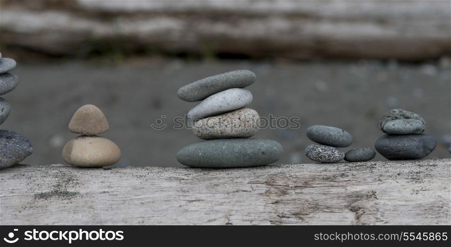 Close-up of stacks of stones in a row, Deception Pass State Park, Oak Harbor, Washington State, USA
