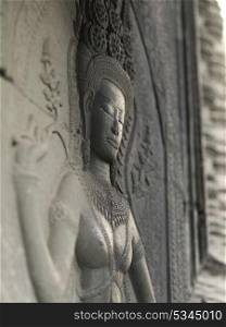 Close-up of statue carved in temple, Krong Siem Reap, Siem Reap, Cambodia