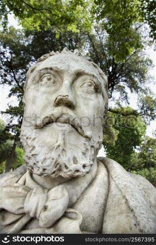 Close-up of statue of bearded man in Rome, Italy.