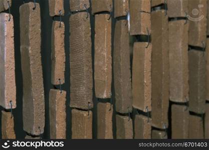 Close-up of stone bricks hanging with wire